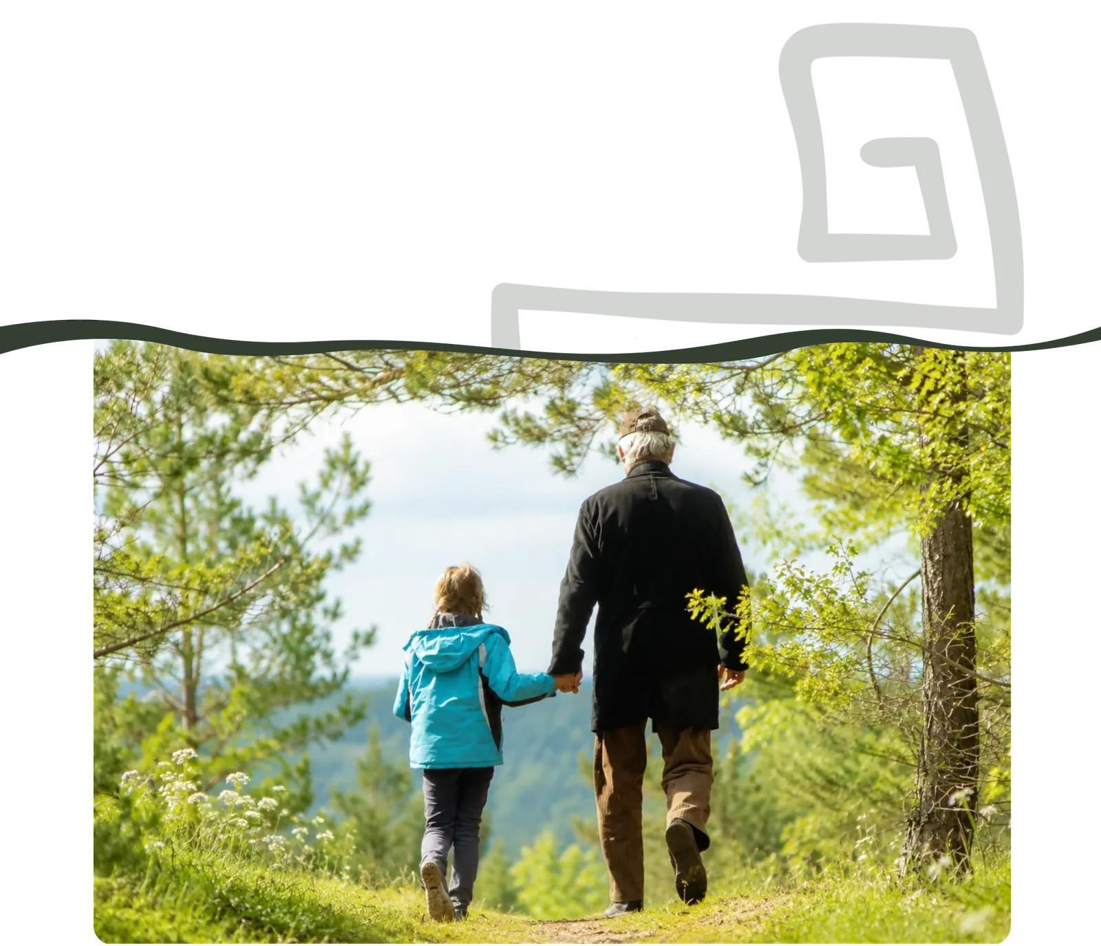 Un grand-père et un enfant marchent main dans la main